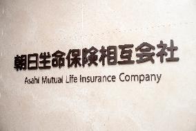 Asahi Mutual Life Insurance Company signboard, logo